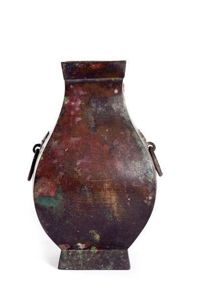 null CHINA - HAN Period (206 BC - 220 AD)

Bronze "fanghu" shaped vase with green...