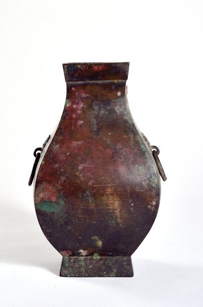 null CHINA - HAN Period (206 BC - 220 AD)

Bronze "fanghu" shaped vase with green...