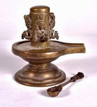 null NEPAL - 19th century

Brass Yoni lingam with relief decoration of four busts...