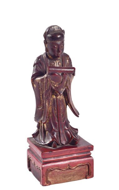 null VIETNAM - 19th century

Small dignitary statuette in gold lacquered wood, standing...