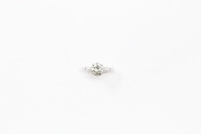 null 18k (750) white gold solitaire set with a round brilliant cut diamond in claw...