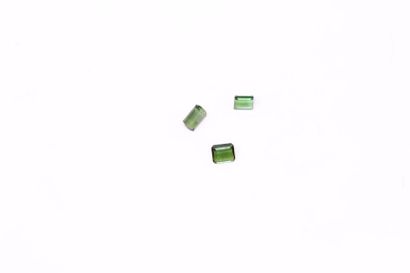 null Set of three rectangular green tourmalines on paper. 

Weight: approx. 4.80...