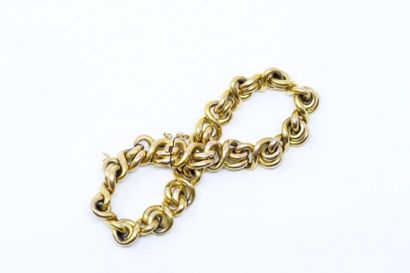null Bracelet en or jaune 18k (750) à maille byzantine. Chaînette de sécurité (acc.).

Tour...
