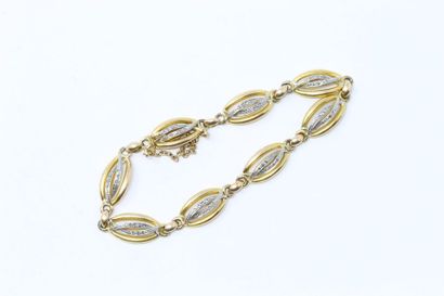null 18k (750) yellow and white gold bracelet with oval openworked mesh adorned with...