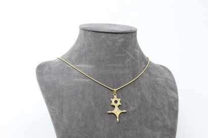 null 18k (750) yellow gold chain with an 18k (750) yellow gold pendant depicting...