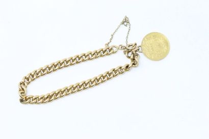 null Bracelet en or jaune 18k (750) à maille gourmette orné d'une pièce en or de...