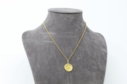 null 18k (750) yellow gold chain with chain link and its medal representing Saint...