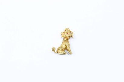 null 18k (750) yellow gold poodle brooch with small pink sapphires stylizing the...