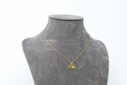 null 18k (750) yellow gold chain with three small medals (zodiacal signs: cancer,...