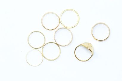 null Set in 18k (750) yellow gold of seven wedding rings and one LB ciphered ring...