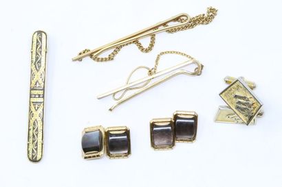 null Set consisting of three tie clips, two of which are gold-plated (one signed...