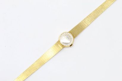 null THE LIGHT

Ladies' wristwatch in 18k (750) yellow gold, round case, cream dial...