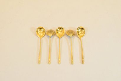 null Five teaspoons of silver-gilt. 

Russian work, 19th century. 

Weight: 106.52...