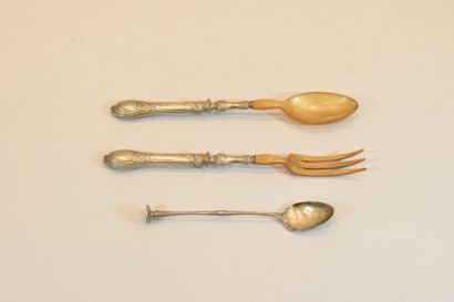 null Silver cocktail spoon and two horn serving spoons, the handles in silver filled...