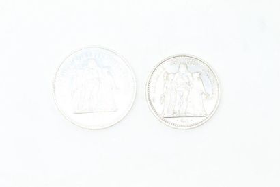 null Set of two silver coins including:

- 10 franc coin Hercules (1967)

- 50 franc...