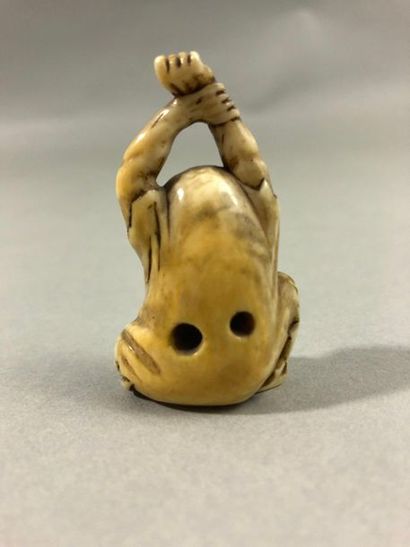 null JAPAN - 19th century

Netsuke in ivory, Daruma stretching out of his meditation....