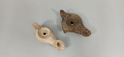 null Set of two oil lamps, one of which is a Hellenistic type with a louse decorated...