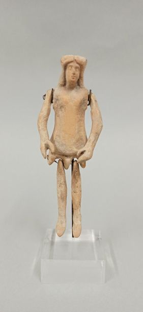 Feminine doll with articulated legs and arms....