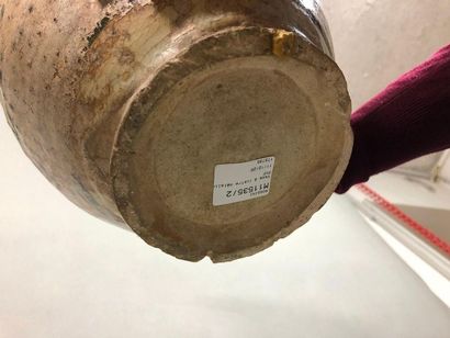 null IRAN, 14th century,

Ceramic vase of baluster shape, flared neck. 

Oydations,...