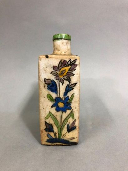  IRAN, 20th century, In the Kadjar style, 
Ceramic flask decorated with flowers and...