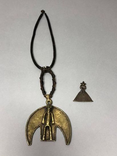 A set of two bronze pendants, one a late...