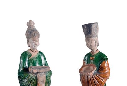  CHINA, MING Era (1368 - 1644) 
An important pair of standing dignitaries in green...