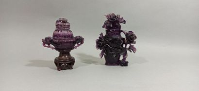 null CHINE - XXe siècle

Ensemble en améthyste : Vase couvert à décor de fleurs sculptées...