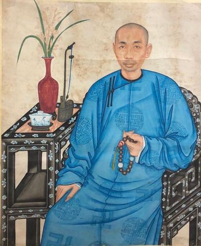 null CHINA - 20th century

Ink and colours on paper, portrait of a seated man holding...
