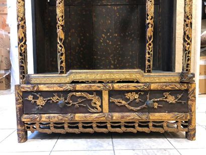 null Black lacquered carved wooden Buddhist altar enhanced with gold, opening in...