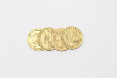 Four gold coins composed of : 

- 20 Francs...