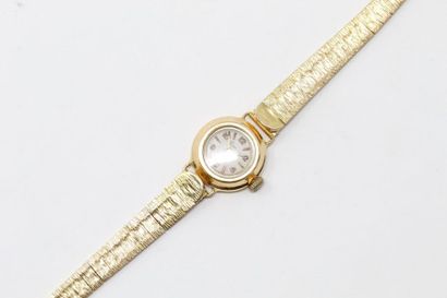 null Montre bracelet de dame, boîtier rond en or jaune 18k (750), cadran gris à index...