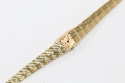 null Montre bracelet de dame en or jaune 18k (750), boîtier carré à fond doré et...