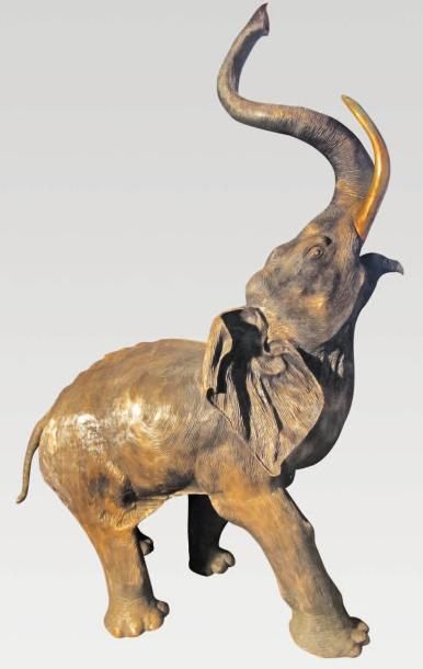null Sculpture en bronze patiné représentant un éléphanteau. (manque une défense...