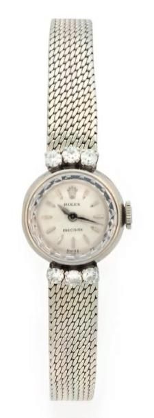 ROLEX. Vers 1960 / 70 Montre bracelet de dame ronde diamètre: 15 mm en or blanc 18...