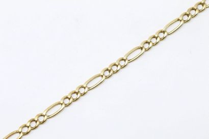 null Bracelet en or jaune 18k (750) à maille figaro.

Tour de poignet : 21 cm. -...