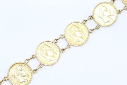 null Bracelet en or jaune 18k (750) orné de huit pièces de 20 francs Napoléon III...