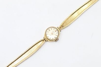 SPIR SPIR

Montre bracelet de dame en or jaune 18k (750), cadran rond à index batons...