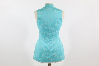 MUGLER MUGLER
Veste-robe a zip sans manche, bleu turquoise à motif floraux.
Circa...