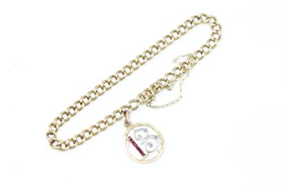 null 18k (750) yellow gold bracelet with an openwork charm featuring the number 13....