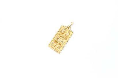null Rectangular pendant in 18k (750) yellow gold. 

African work. 

Weight : 8.06...