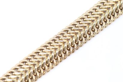 null 18k (750) yellow gold bracelet with braided mesh.

Wrist circumference: 19.5...