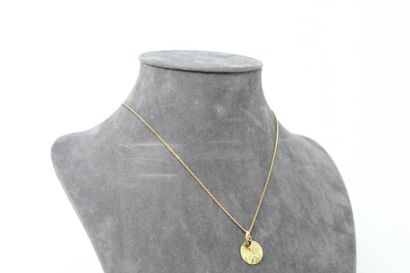 null Baptismal medal in 18k (750) yellow gold and its 18k (750) yellow gold chain...