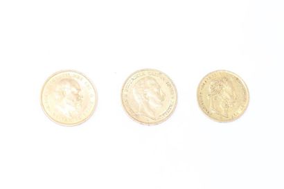 null Lot composé de trois pièces en or : 

- 20 francs ou 8 Florins François Joseph...