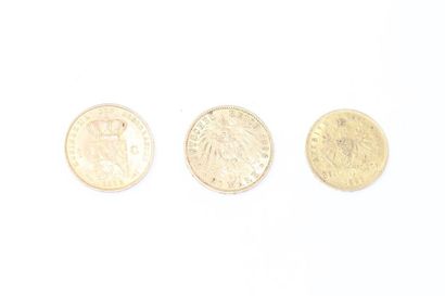null Lot composé de trois pièces en or : 

- 20 francs ou 8 Florins François Joseph...