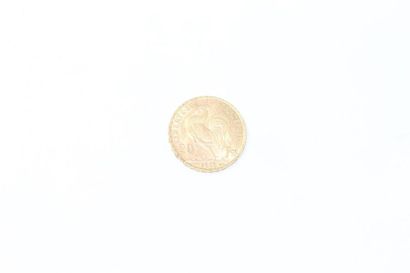 null Gold coin of 20 francs au Coq (1911). 

APC to SUP.

Weight : 6.45 g.