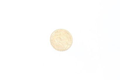 null Gold coin of 20 francs au Coq (1904). 

TB to APC.

Weight : 6.45 g.