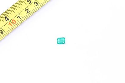 null Rectangular emerald with cut sides on paper.

Weight of the stone: 1.15 ct....