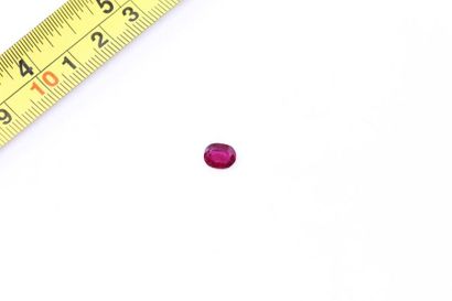 null Oval ruby on paper.

Weight of the stone: 1.75 ct. 