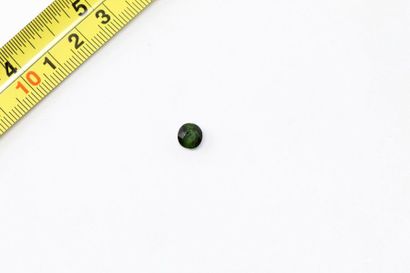 null Round green tourmaline.

Probably unheated and Mozambique. 

Weight: approx....