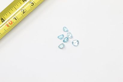 null Set of six trillion blue (natural) zircons on paper. 

Weight: approx. 7.25...